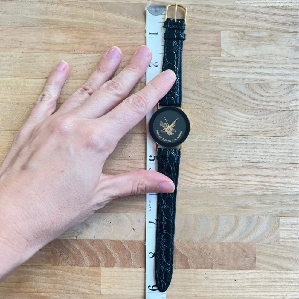 Hawaii Baptist academy black and gold tone watch NEW BATTERY